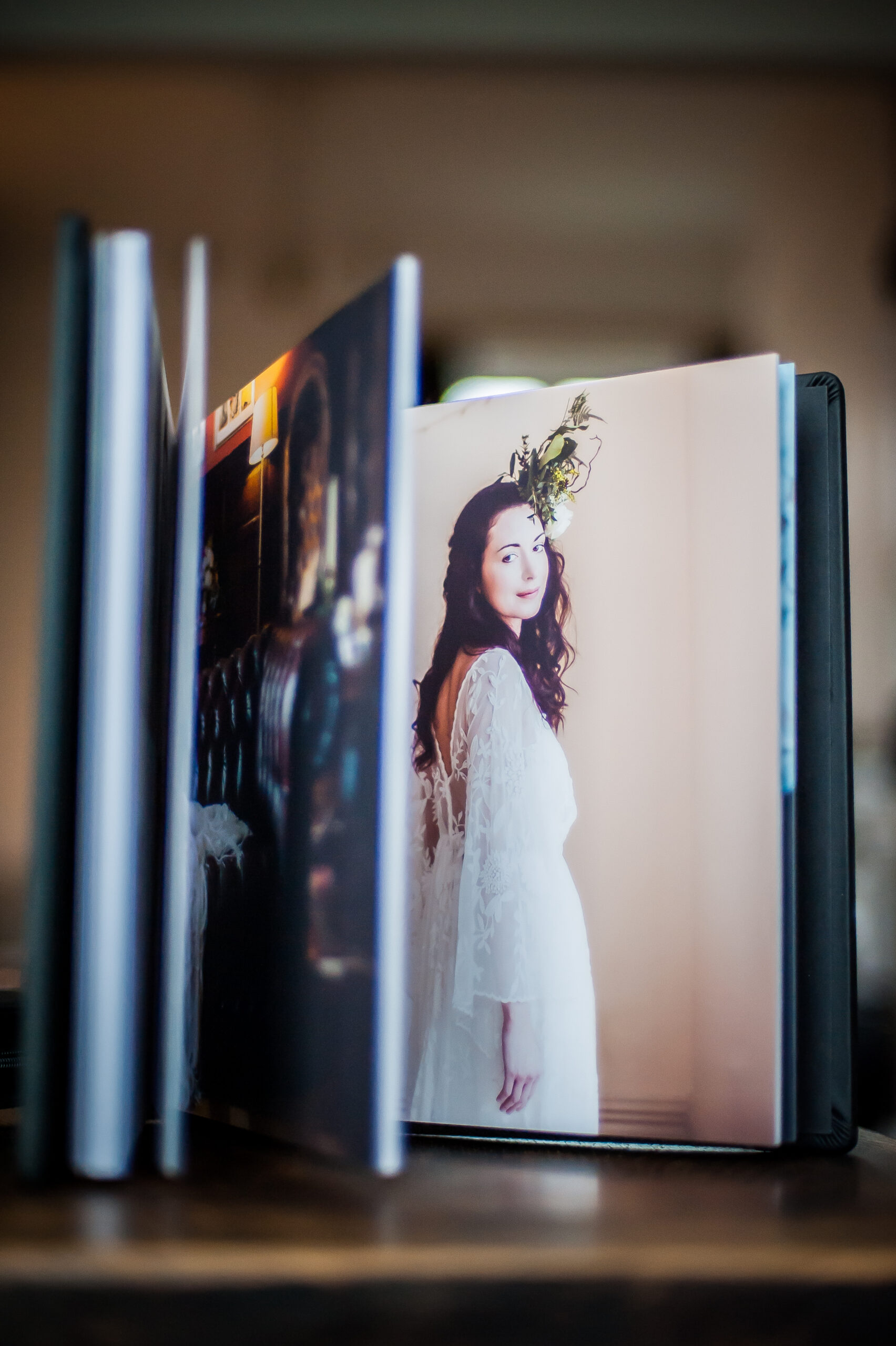 a wedding album standing up and showing open pages