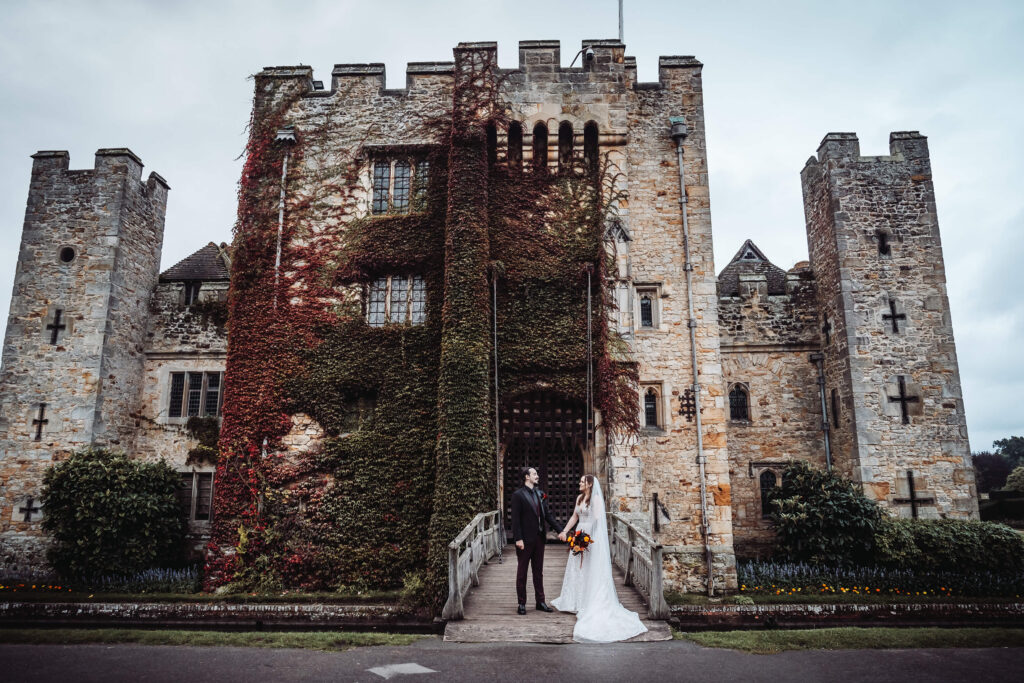 Could hold hands on a bridge to the entrance of Hever castle. This is a wide shot showing the whole building.